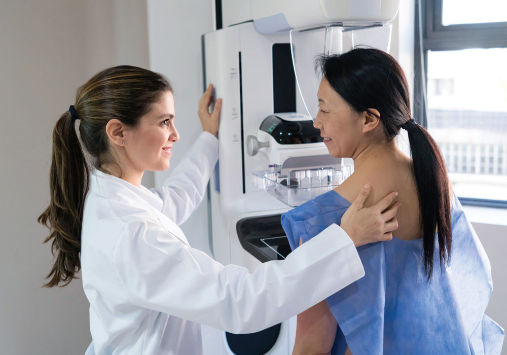 young woman getting a mammogram